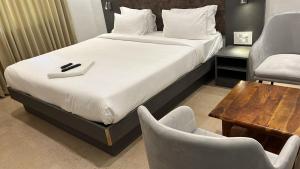 Hotel GSR Tumkur客房内的一张或多张床位