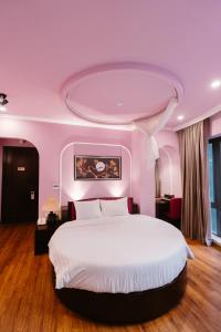 Postel nebo postele na pokoji v ubytování A&D Luxury Hotel
