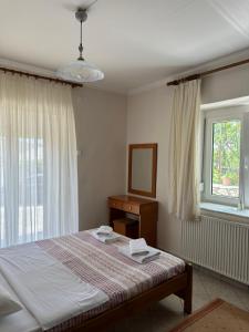 Φωτογραφία από το άλμπουμ του Kate's Guesthouse στον Θεολόγο