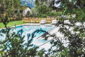 Bazén v ubytovaní Bergresort Zugspitze Ehrwald by ALPS RESORTS alebo v jeho blízkosti