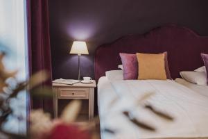 Postel nebo postele na pokoji v ubytování Hotel Adria
