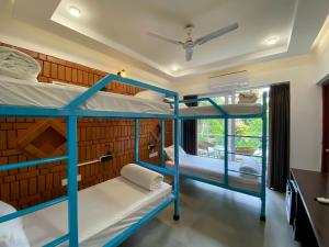 Postel nebo postele na pokoji v ubytování DownTown Hostels - Anjuna + 37 fotografií