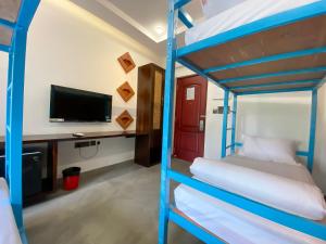 Postel nebo postele na pokoji v ubytování DownTown Hostels - Anjuna