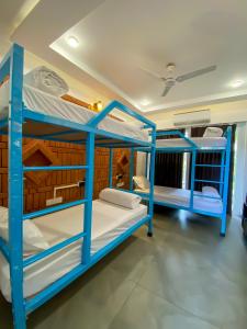Postel nebo postele na pokoji v ubytování DownTown Hostels - Anjuna
