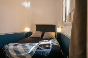 Postel nebo postele na pokoji v ubytování Cute Apartment