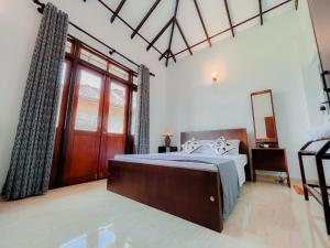 Postel nebo postele na pokoji v ubytování R & R Home Stay