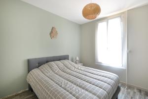 Postel nebo postele na pokoji v ubytování La Normande - Belle maison à 200m de la plage