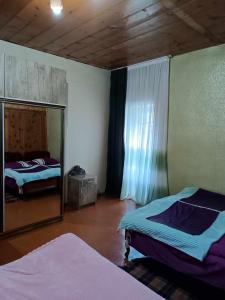 Krevet ili kreveti u jedinici u okviru objekta Guest House in Zhabeshi Lali