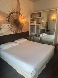 Un ou plusieurs lits dans un hébergement de l'établissement Hotel Vivaldi