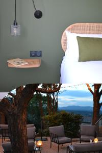 1 dormitorio con cama y vistas a las montañas en Hôtel La Garrigue & Bar Piscine, en Venasque
