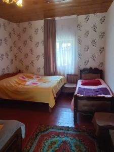 Krevet ili kreveti u jedinici u okviru objekta Guest House in Zhabeshi Lali