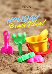 vibes da spiaggia aaturday con un giocattolo da spiaggia nella sabbia di Horison Ultima Seminyak Bali - CHSE Certified a Seminyak