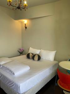 Rúm í herbergi á Chuxu Homestay