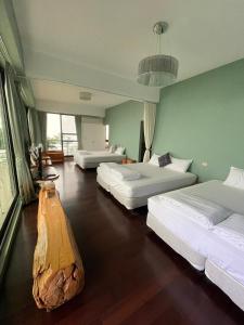 Rúm í herbergi á Chuxu Homestay