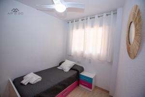 Łóżko lub łóżka w pokoju w obiekcie Fuerte Apartment Great Location