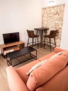 a living room with a couch and a table at Torre Solana 41 in Cádiz