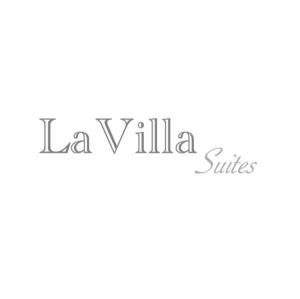 a sign for the la villa suites at La Villa Suite 2 in Fabriano