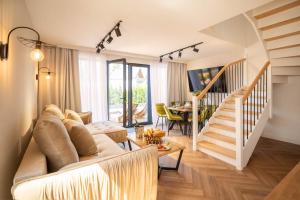 Χώρος καθιστικού στο Olivina Park Spa - domki z dostępem do krytego basenu, saun, wyżywienia i atrakcji dla dzieci