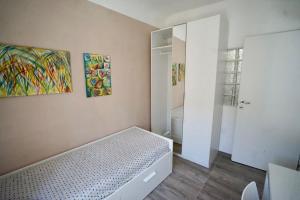 Katil atau katil-katil dalam bilik di La casa in centro