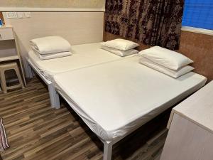 Krevet ili kreveti u jedinici u okviru objekta Wee Classic Inn