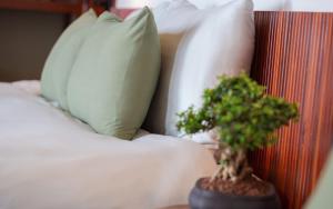 Voodi või voodid majutusasutuse Pi Boutique Hotel toas