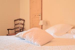 Posteľ alebo postele v izbe v ubytovaní La Ferme Du Chapi