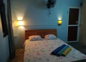 Postelja oz. postelje v sobi nastanitve Tilapasse resto & guest house