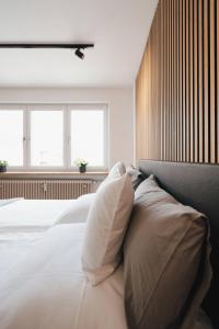 Postel nebo postele na pokoji v ubytování NEU I Stilvoll I Boxspring I Smart TV I Zentral