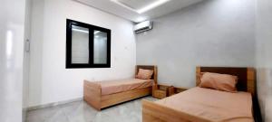 Postel nebo postele na pokoji v ubytování villa arij Djerba