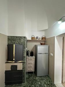 ロコロトンドにあるAngel Houseの小さなキッチン(冷蔵庫、電子レンジ付)