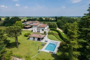 an aerial view of a house with a swimming pool at Casa Del Marchese With Private Pool, Castell’arqua in Vigostano