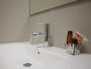 Koupelna v ubytování Hotel Sole + 37 fotografií