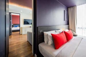 Blue Hippo & Red Crocodile Hotel客房内的一张或多张床位