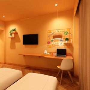 TV a/nebo společenská místnost v ubytování Bloom Hotel - Golf Course Road, Sector 43