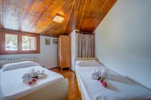 Katil atau katil-katil dalam bilik di Il Rododendro City Center - Happy Rentals