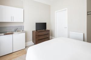 Katil atau katil-katil dalam bilik di Host & Stay - Clifton Studios +25 gambar