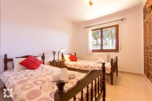 Postel nebo postele na pokoji v ubytování Villa Kelly 12 by Abahana Villas