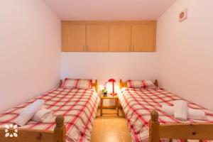 Postel nebo postele na pokoji v ubytování Villa Kelly 12 by Abahana Villas