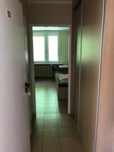 Postel nebo postele na pokoji v ubytování Dom Studenta Pod Jeleniem