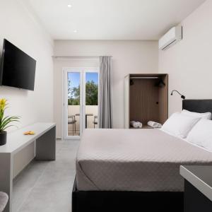 Katil atau katil-katil dalam bilik di Ilios Properties - next to Gouvia Beach