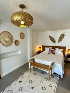 En eller flere senge i et værelse på Santa Lucia Sea View