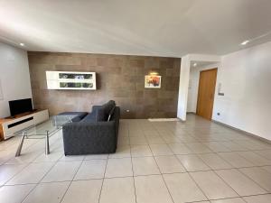 TV a/nebo společenská místnost v ubytování Agi Drugstore Apartments