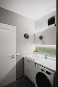 Kúpeľňa v ubytovaní Butique Apartman Grand