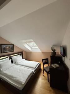 Ліжко або ліжка в номері Atrium