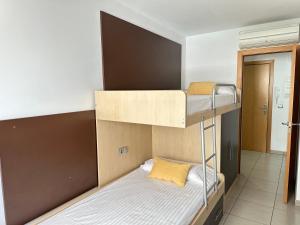Postel nebo postele na pokoji v ubytování Agi Drugstore Apartments