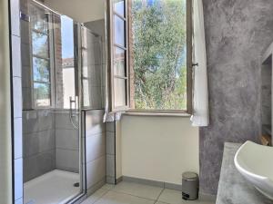 a bathroom with a shower and a sink at La Maison des 2 Ponts Clim Centre in Albi +22 photos