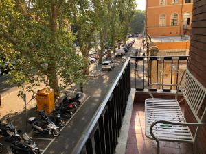 a group of motorcycles parked next to a street at Comics Guesthouse Hostel in Rome