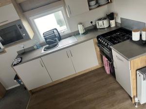 Køkken eller tekøkken på Arthurs Pad WB