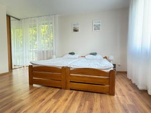 Posteľ alebo postele v izbe v ubytovaní Domino Dom Gościnny