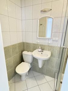 Kúpeľňa v ubytovaní Domino Dom Gościnny